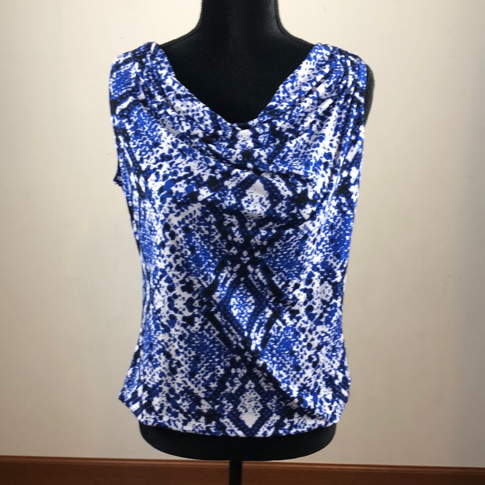 Calvin Klein royal blue, white, and black designed sleeveless blouse. Size Med